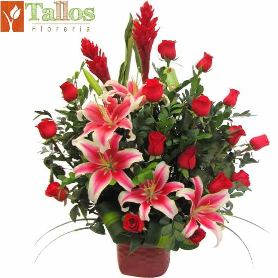 Arreglo floral con gingers rojos rosas rojas y lirios rosados en base de cerámica roja elegante ideal para regalo o decoración con entrega a domicilio en Lima