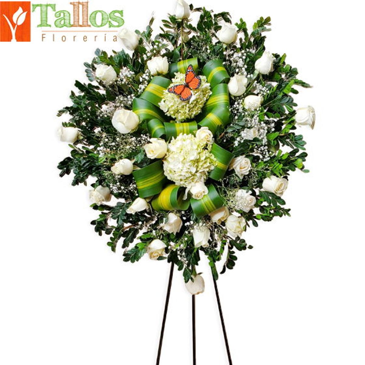 Arreglo floral de condolencias con rosas blancas hortensias y glacenas para velorios elegante y sobrio con entrega a domicilio en Lima