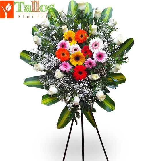 Arreglo floral de condolencias con rosas blancas y gerberas de colores para velorios elegante y respetuoso con entrega a domicilio en Lima